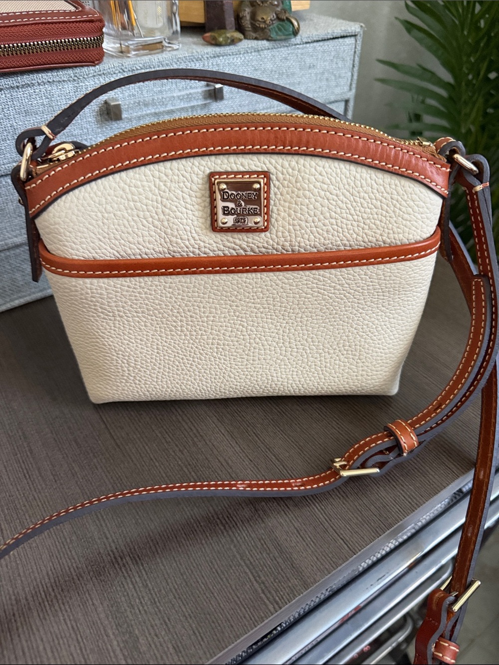 Dooney & Bourke Cream with Tan Trim Pebbled Leather Crossbody